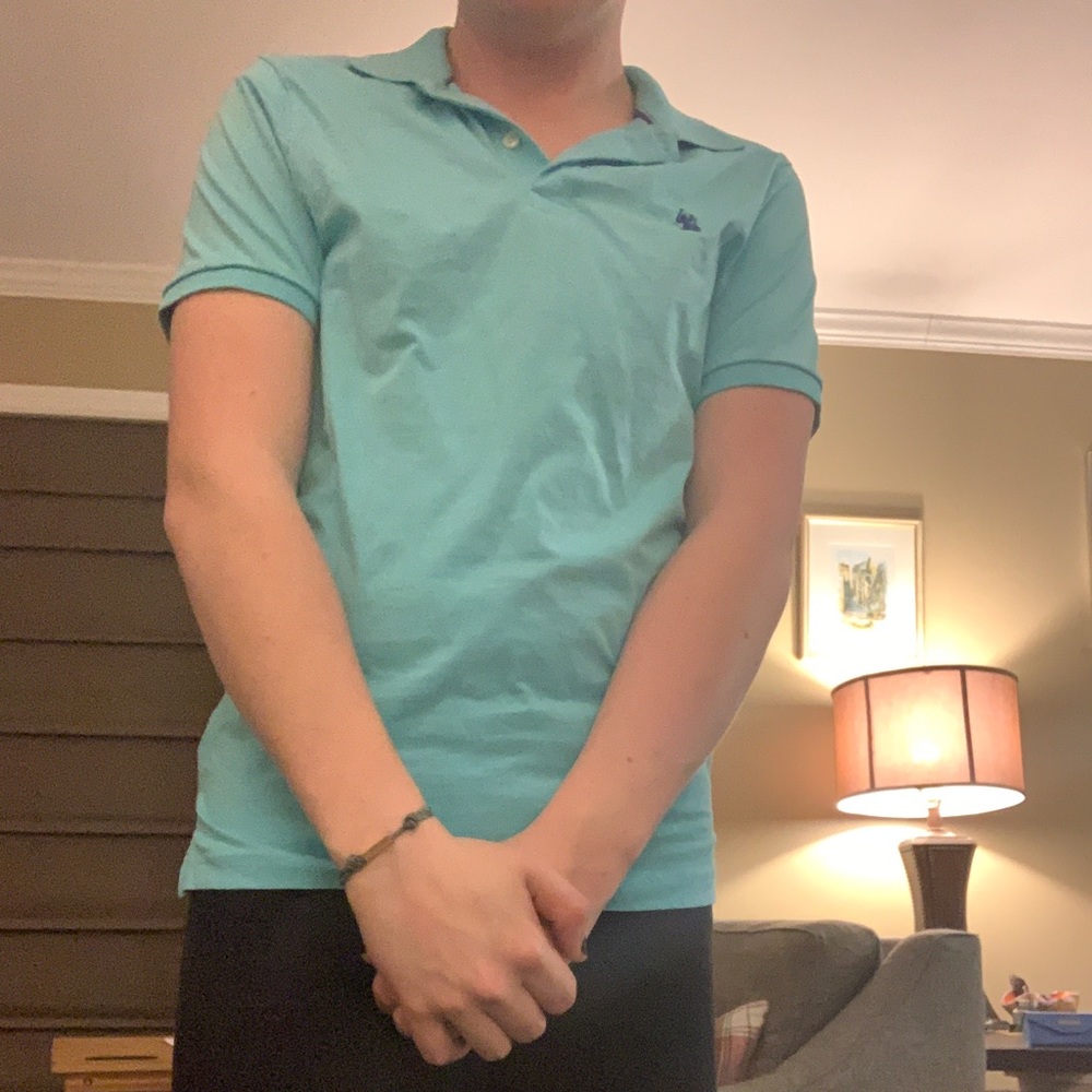 Small, baby blue polo collared shirt